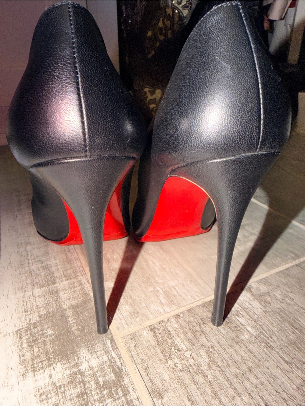 Christian Louboutin Black Leather Stiletto Pumps with Signature Red Sole